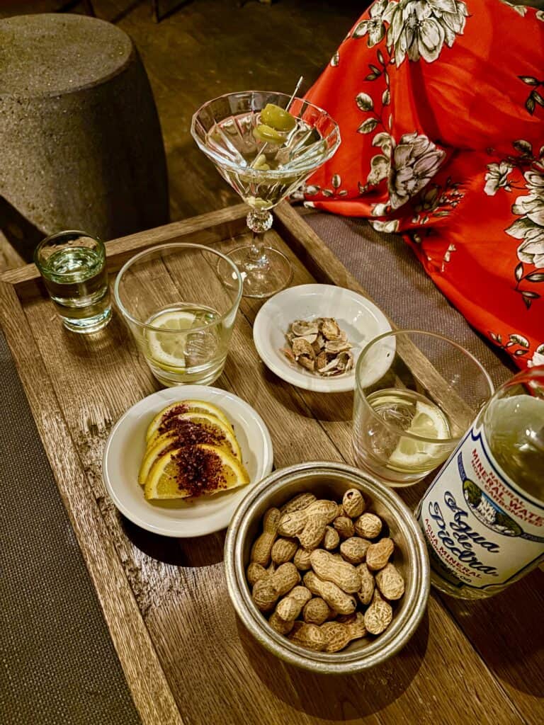 cocktail setup of mezcal and martinis