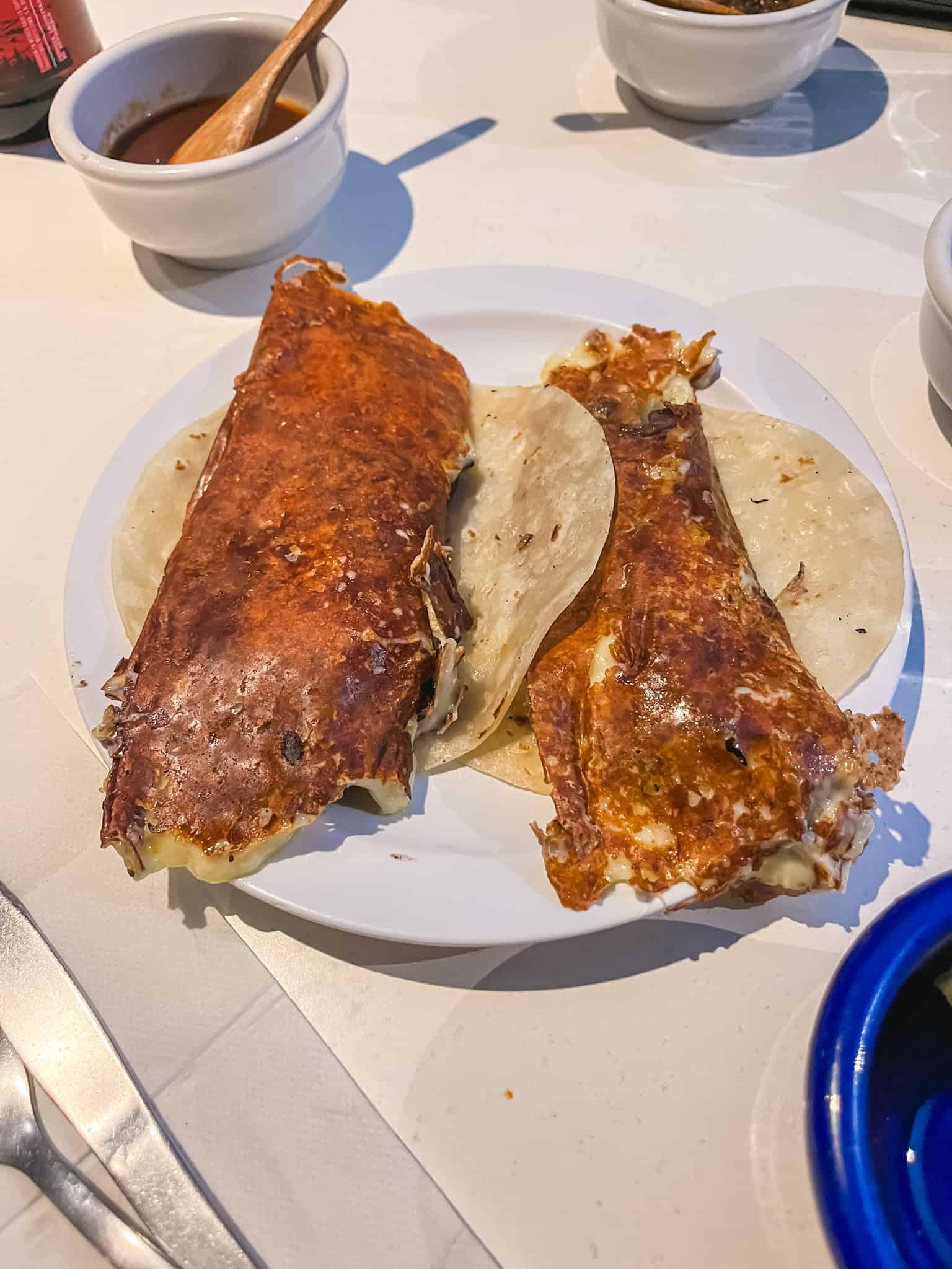 two cheesy tacos in mexico city food tour