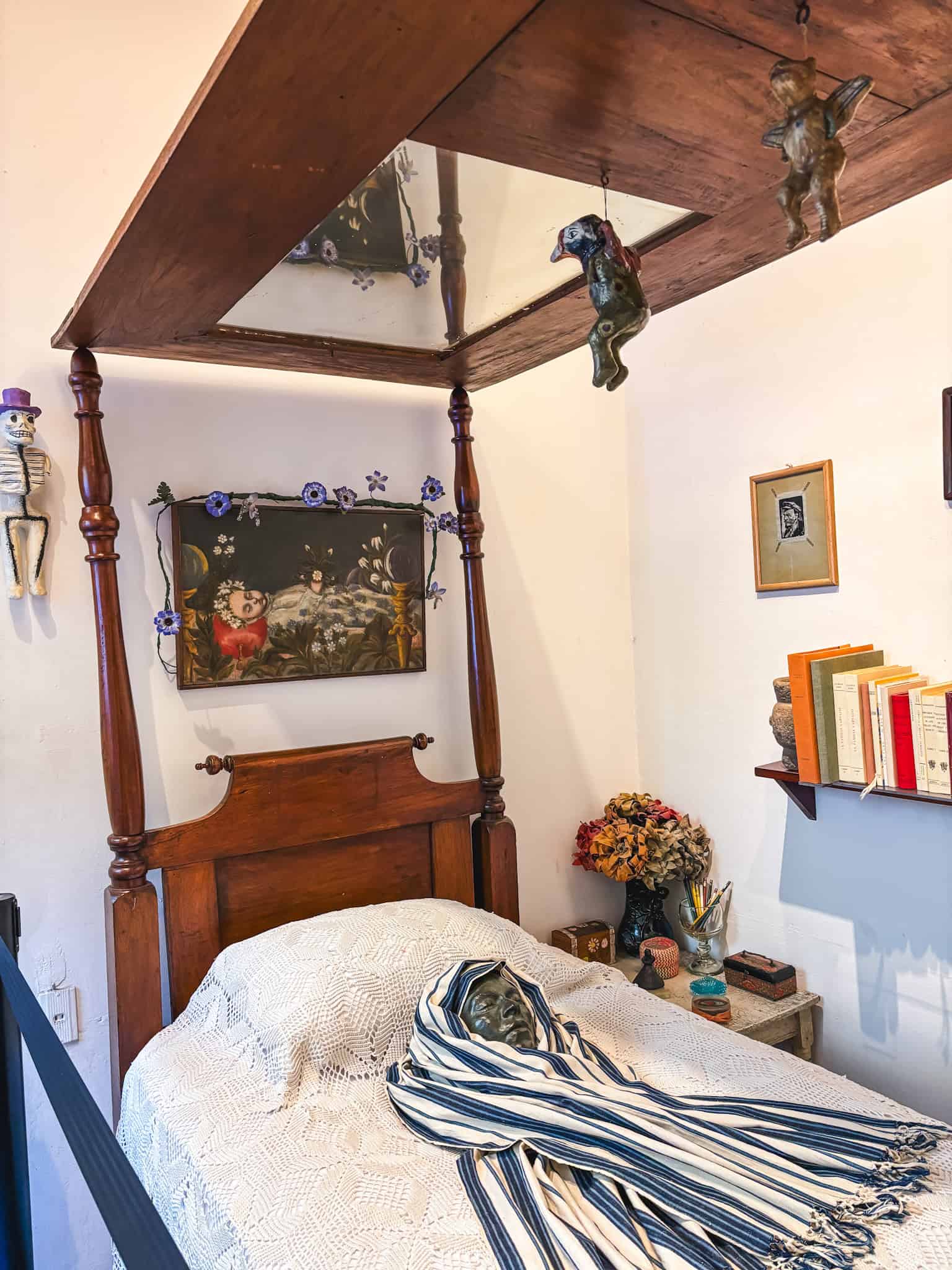 Frida Kahlo’s four-poster bed with the overhead mirror she used to paint self-portraits, displayed inside the Frida Kahlo Blue House.