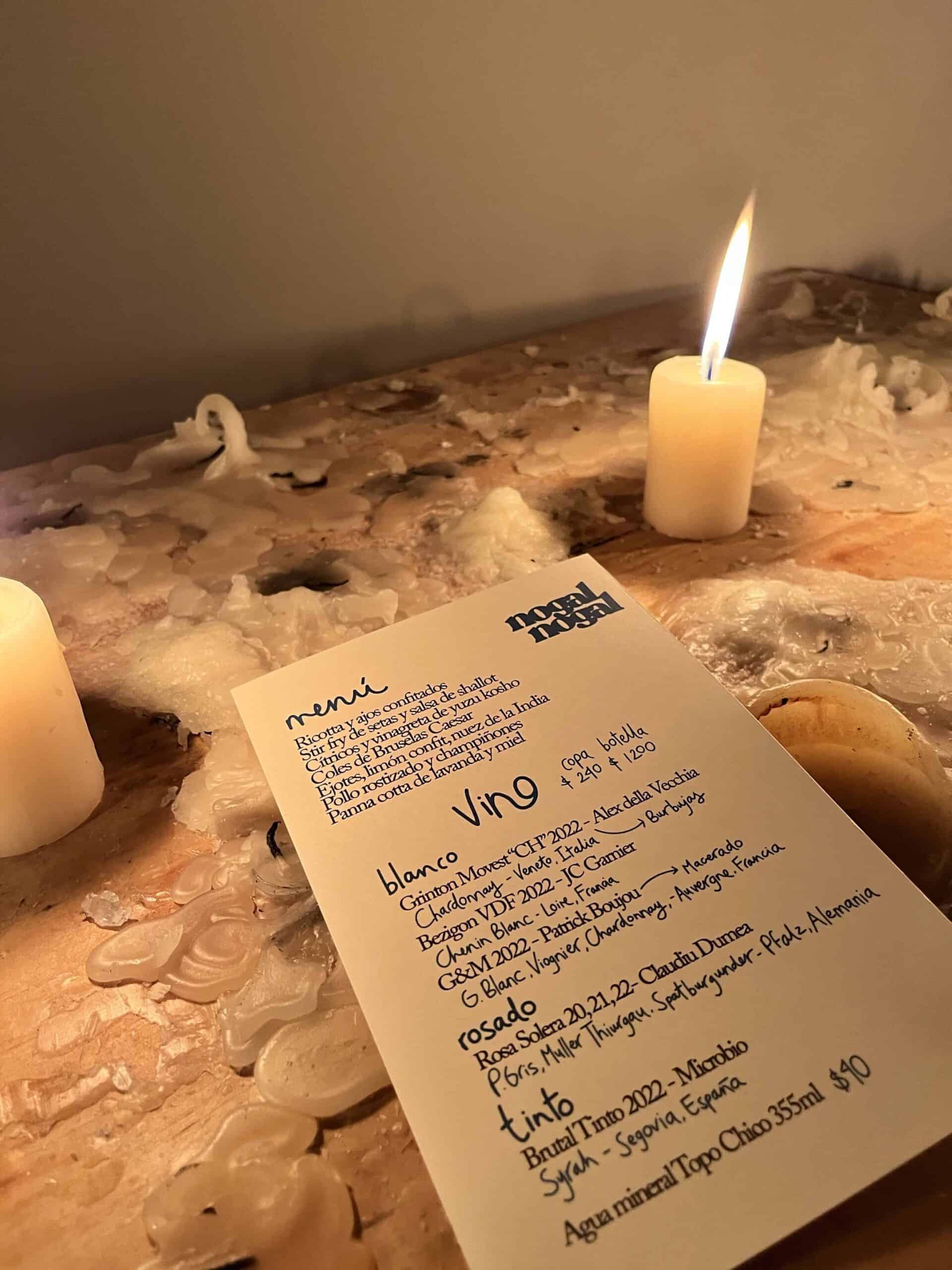 Candlelit table and tasting menu at a fine dining restaurant in Mexico City Nogal Nogal