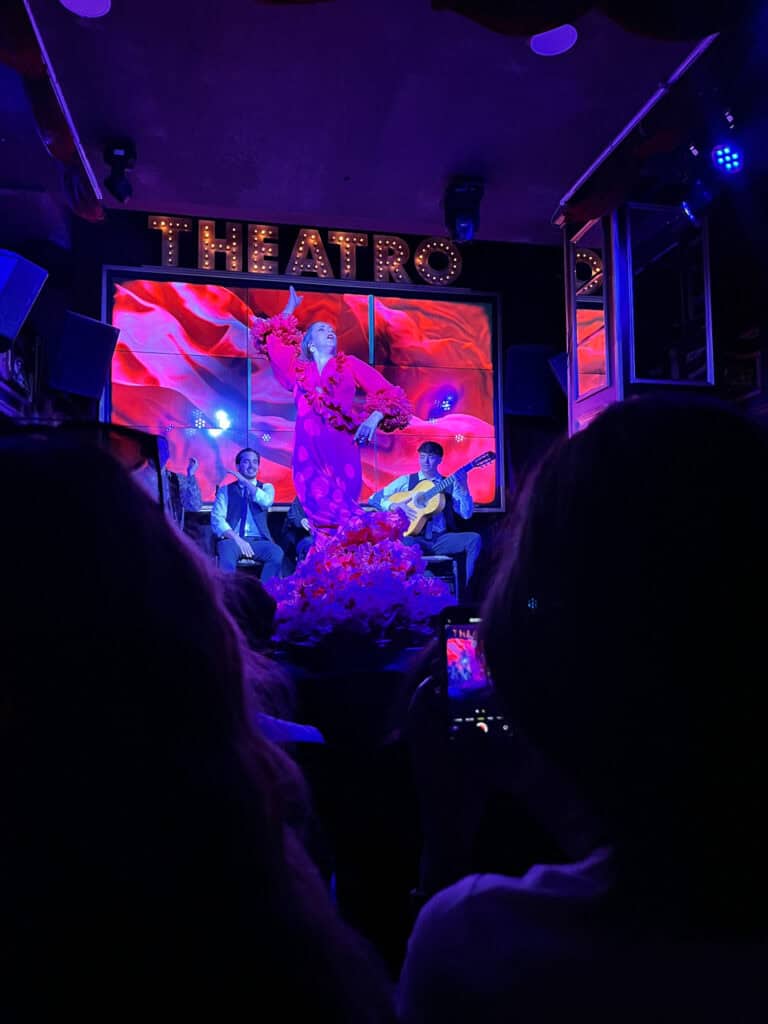 Passionate flamenco performance in intimate teatro setting with traditional costumes - authentic Malaga nightlife and entertainment experience