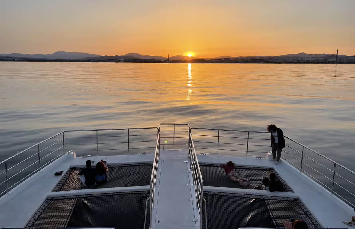 Sunset catamaran cruise deck view, romantic things to do in malaga on the water