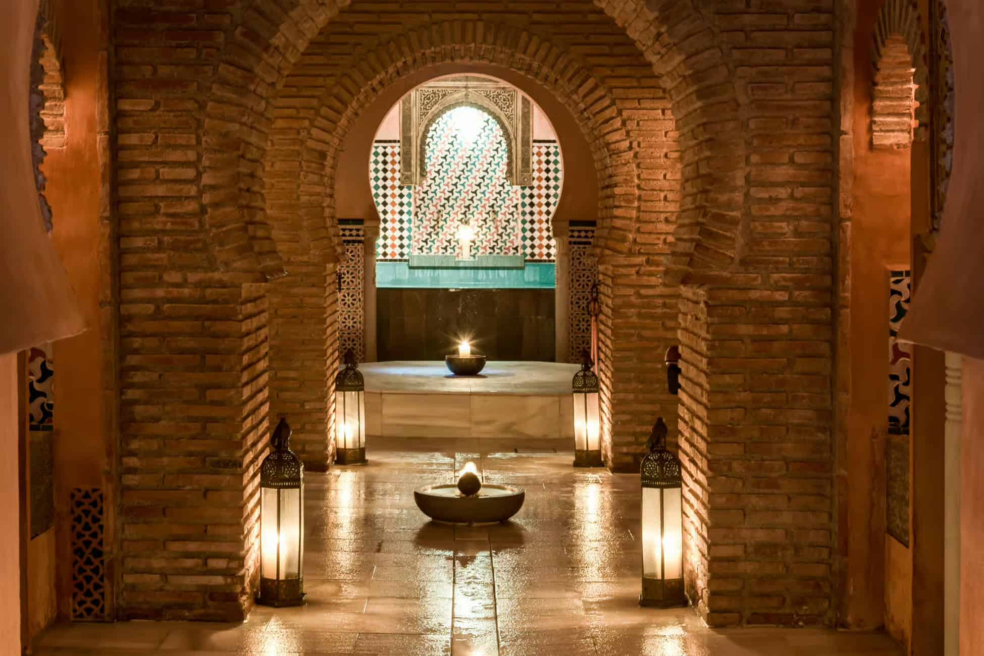 Atmospheric hammam interior with lanterns, authentic malaga wellness experience