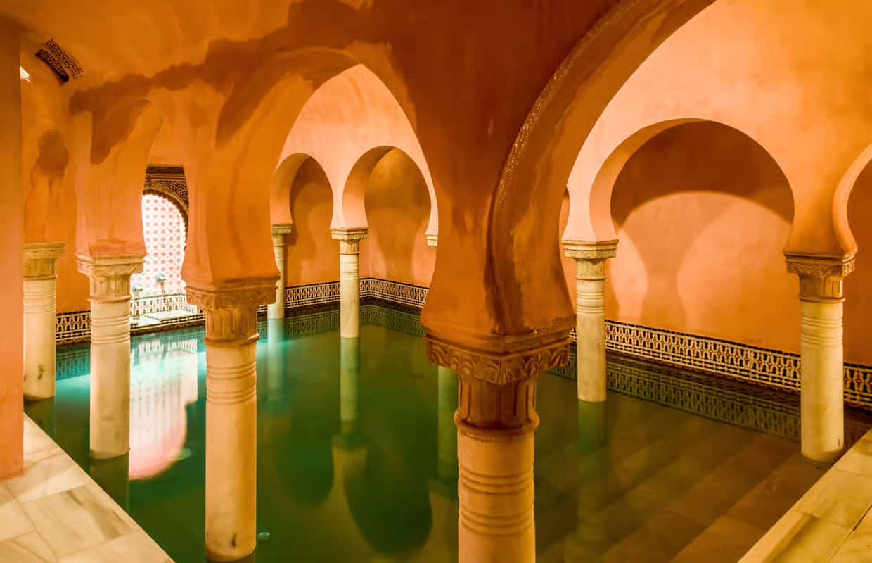 Traditional Moorish arches and pools at malaga hammam spa