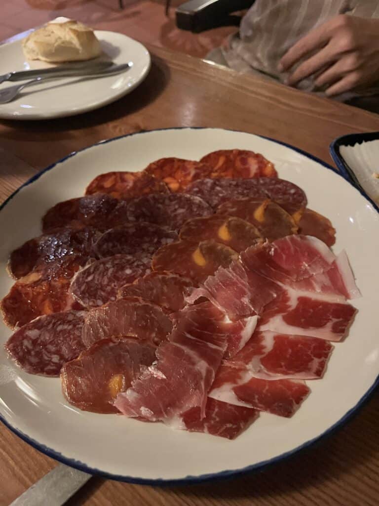 Traditional Spanish charcuterie platter, classic malaga tapas dining