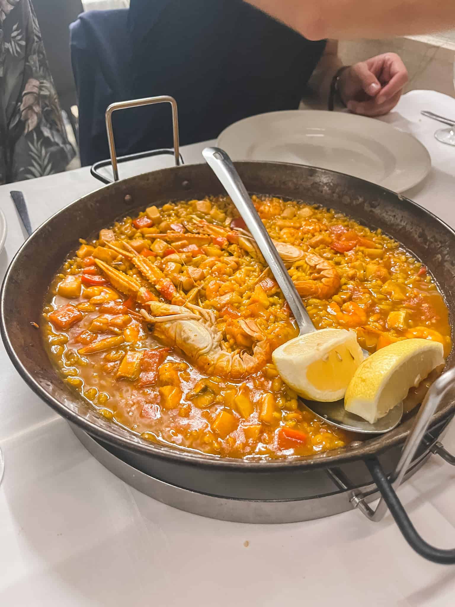 Authentic seafood paella with shrimp and langostinos - signature dish when visiting Malaga