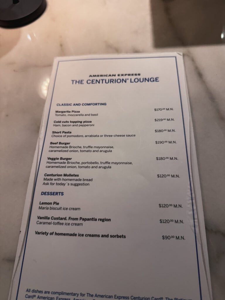 Second page of Centurion lounge menu displaying Cold Starters, Specialities, and Soups sections with items like Tuna Tartar ($240 MXN) and Rib eye taco ($280 MXN)