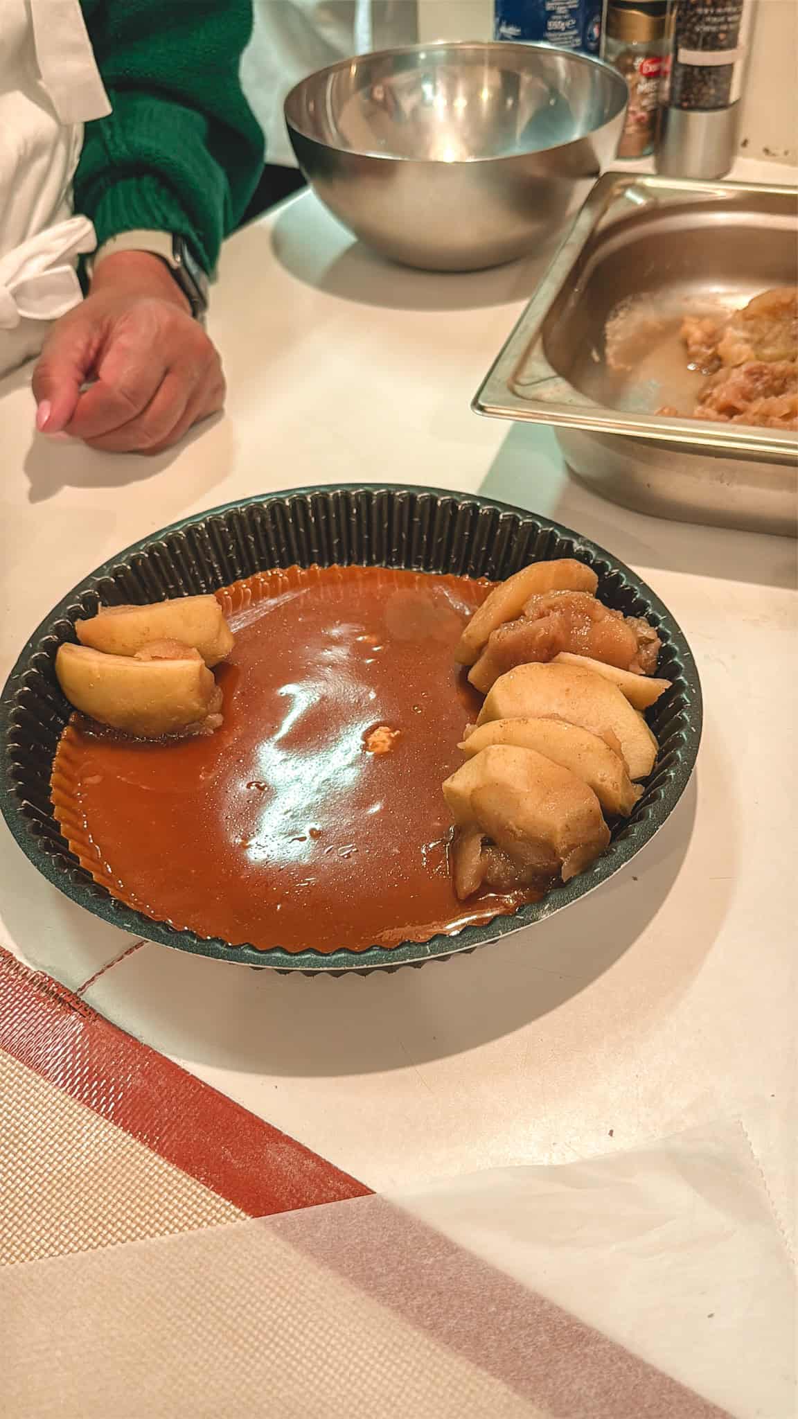 Caramelized apple tart with glossy sauce prepared during cooking class in Paris