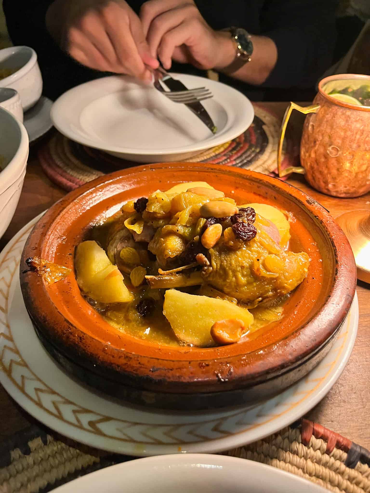 Traditional Moroccan tagine dish at Le 404 restaurant, one of the best things to see in Paris for authentic North African cuisine