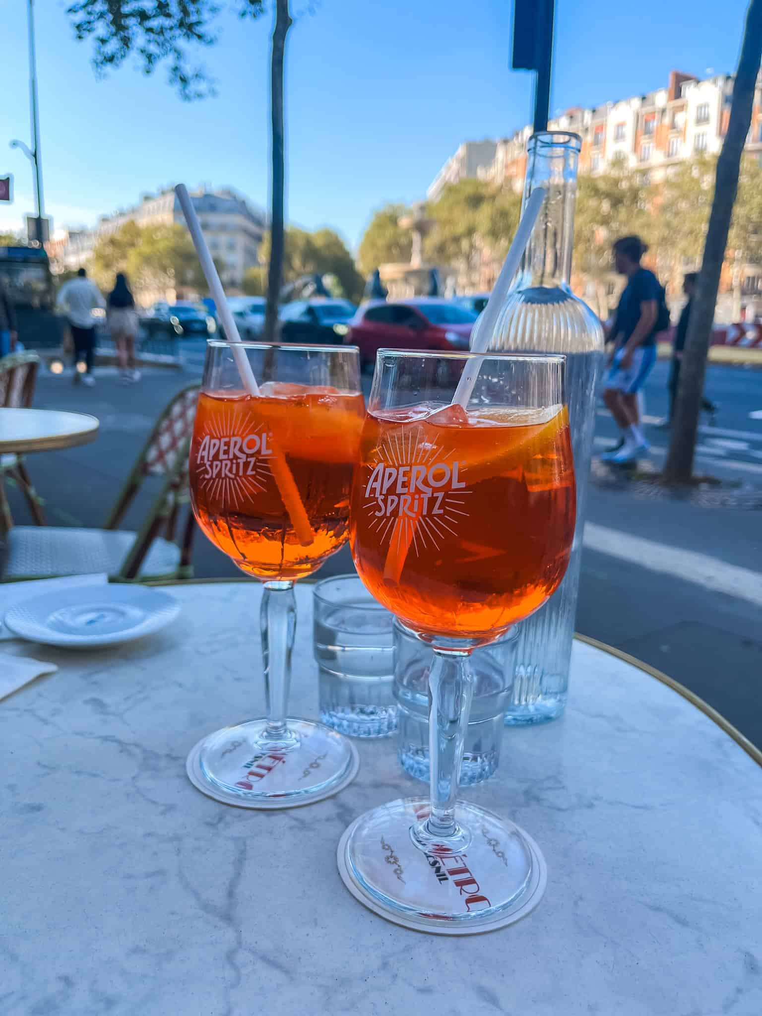 two aperol spritzes at the best bars in paris