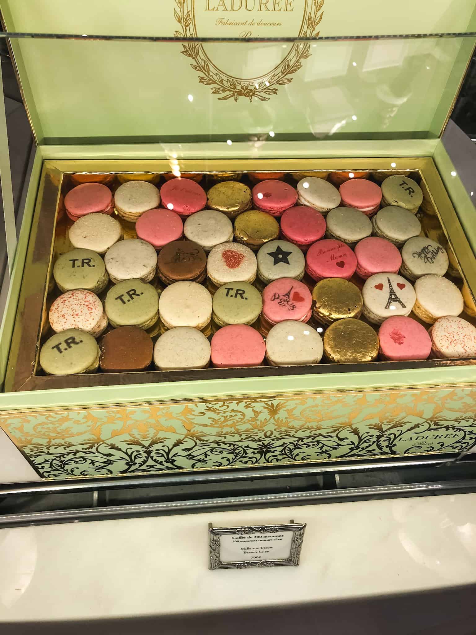 Ladurée macaron collection in elegant gift box showcasing best things to see in Paris luxury pastry tradition