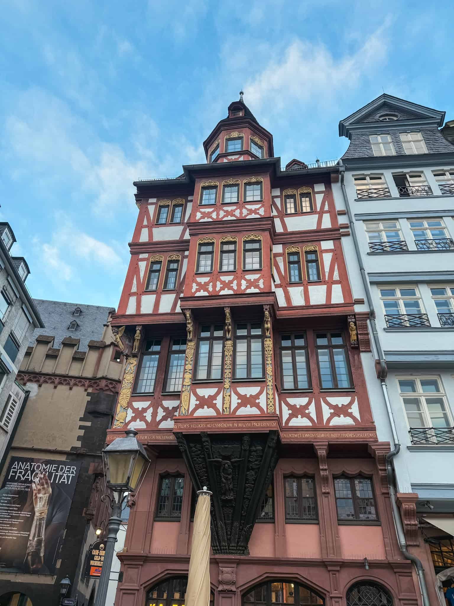 Stunning red half-timbered Renaissance building in Frankfurt's reconstructed old town, best photo spots in Frankfurt