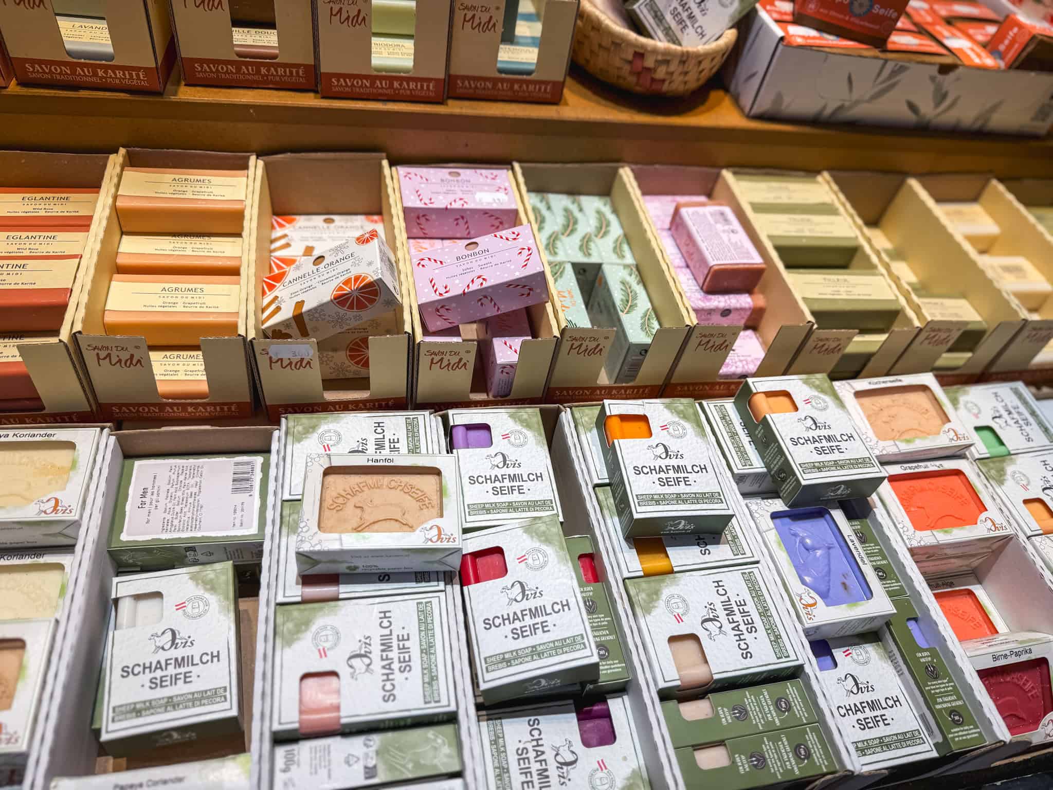 Colorful handmade soaps and artisan products at Kleinmarkthalle, unique souvenirs during a layover in Frankfurt