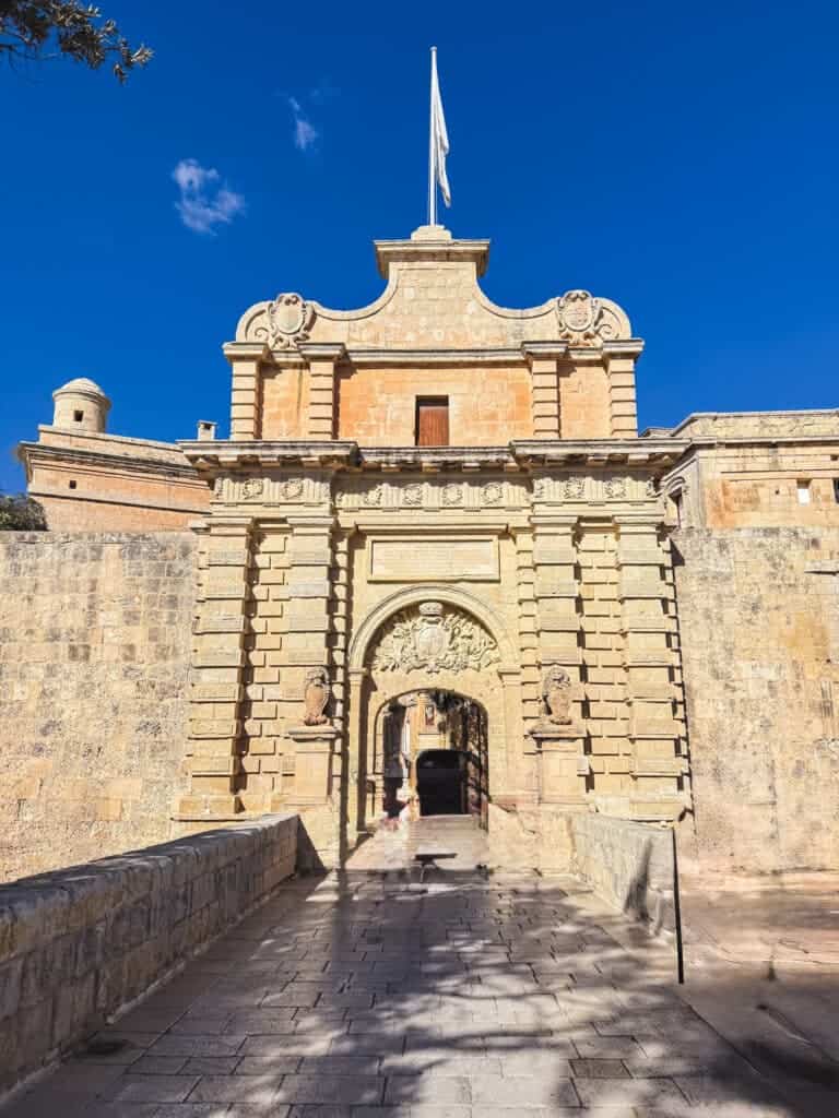 Baroque entrance gate to Mdina's fortified old city, a popular destination when renting a car in Malta for historical sightseeing