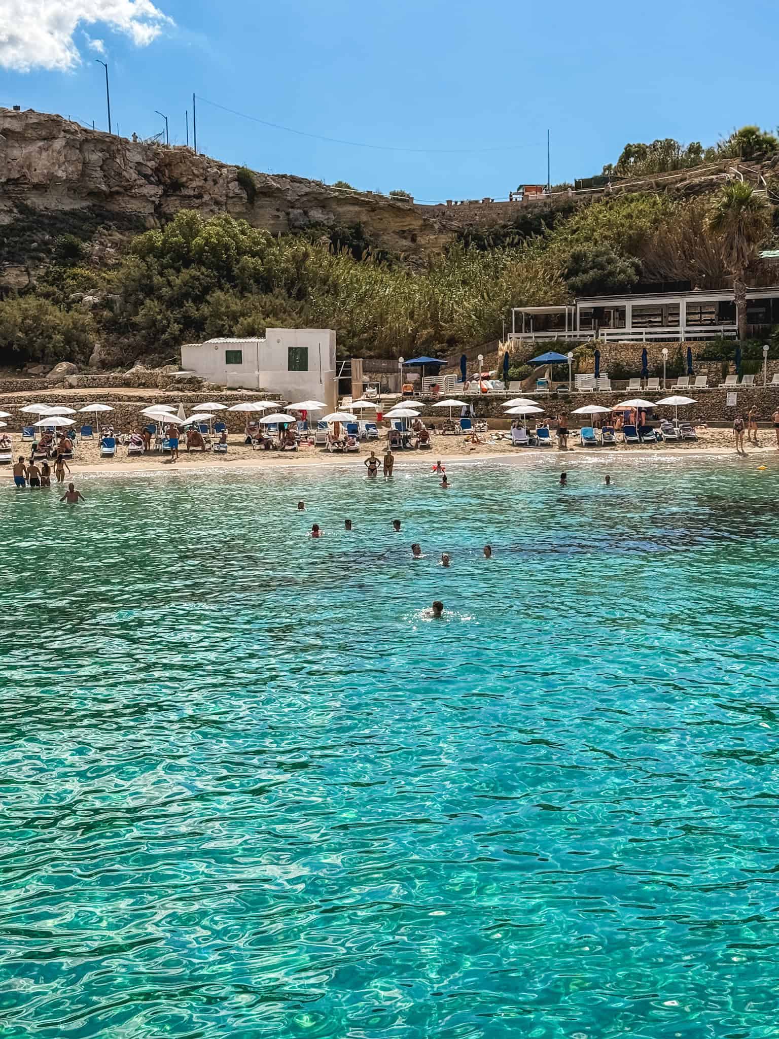 Paradise Bay beach near the Blue Lagoon with turquoise Mediterranean water in Malta
