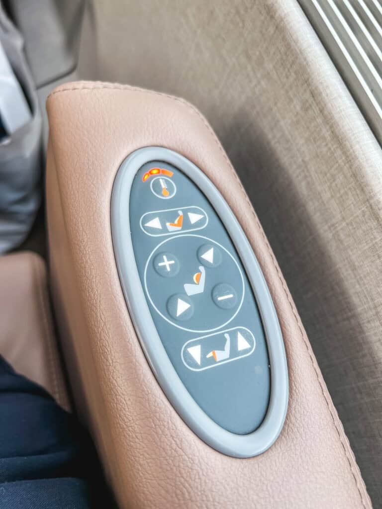 GoldLeaf service seat controls with reclining and adjustment buttons on luxury Canadian train journey
