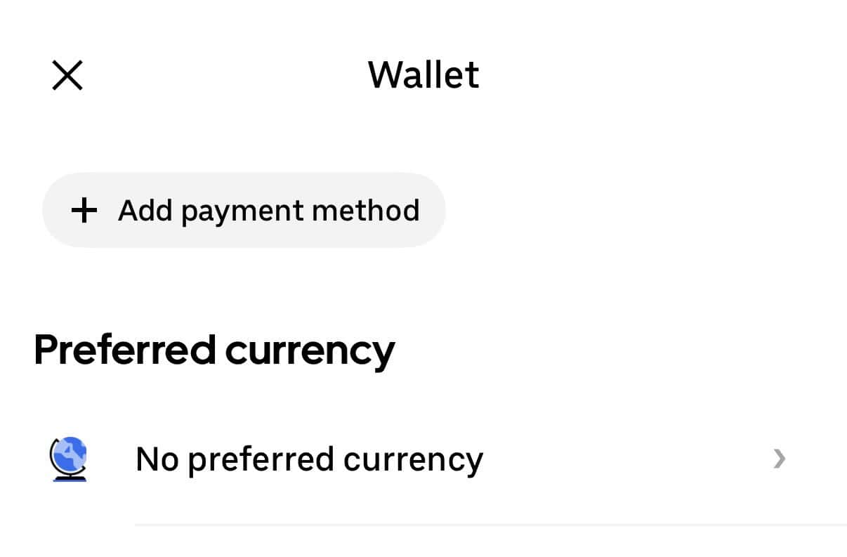 Preferred currency selection screen for international rideshare payments in Mexico