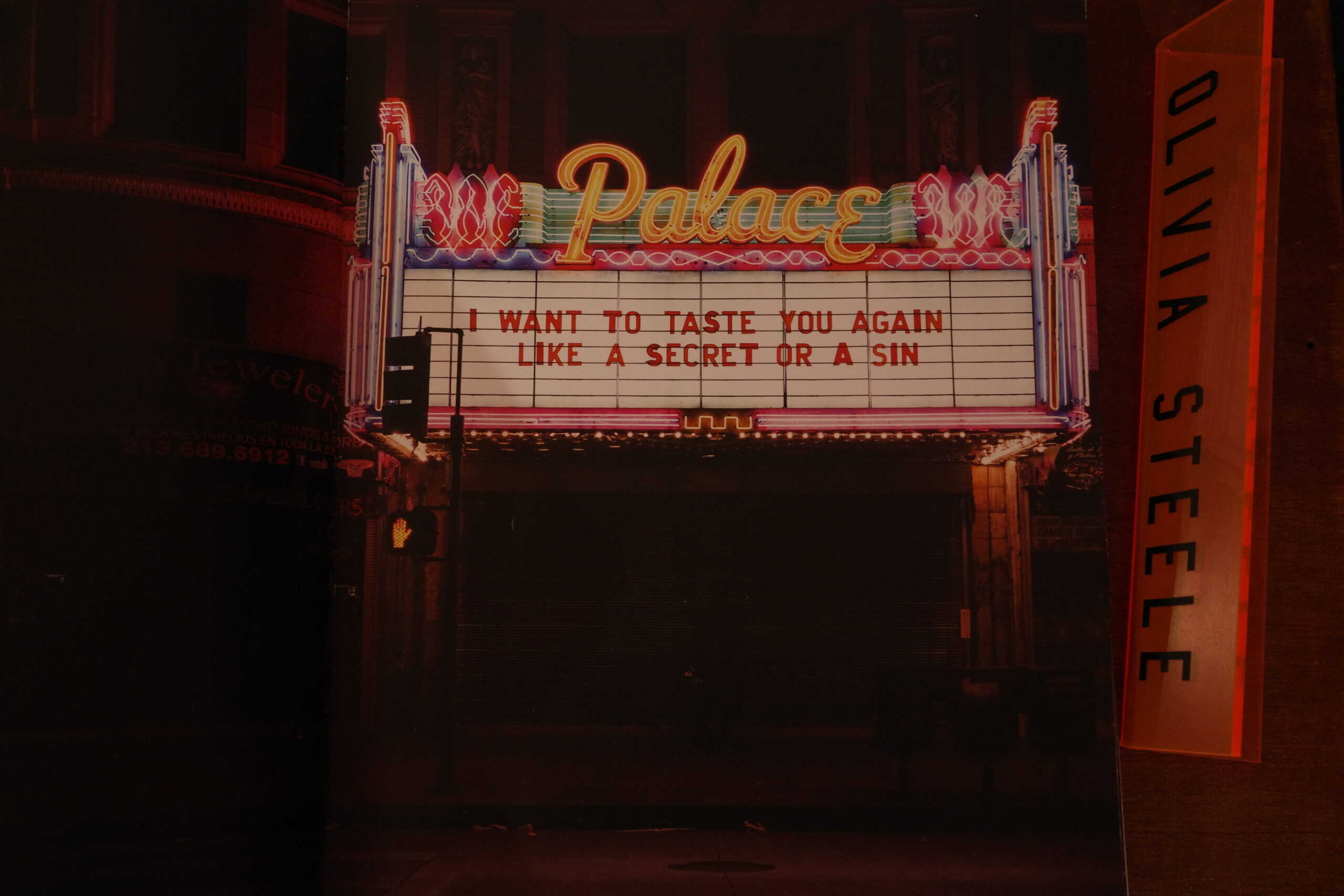 Illuminated Palace theater marquee with romantic lyrics at art week Mexico City neighborhood at Maison Celeste during art week