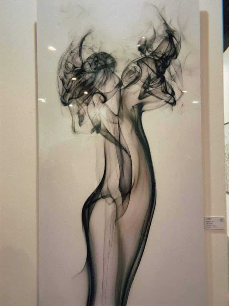 Contemporary figurative artwork featuring abstract female form at CDMX art fair gallery display