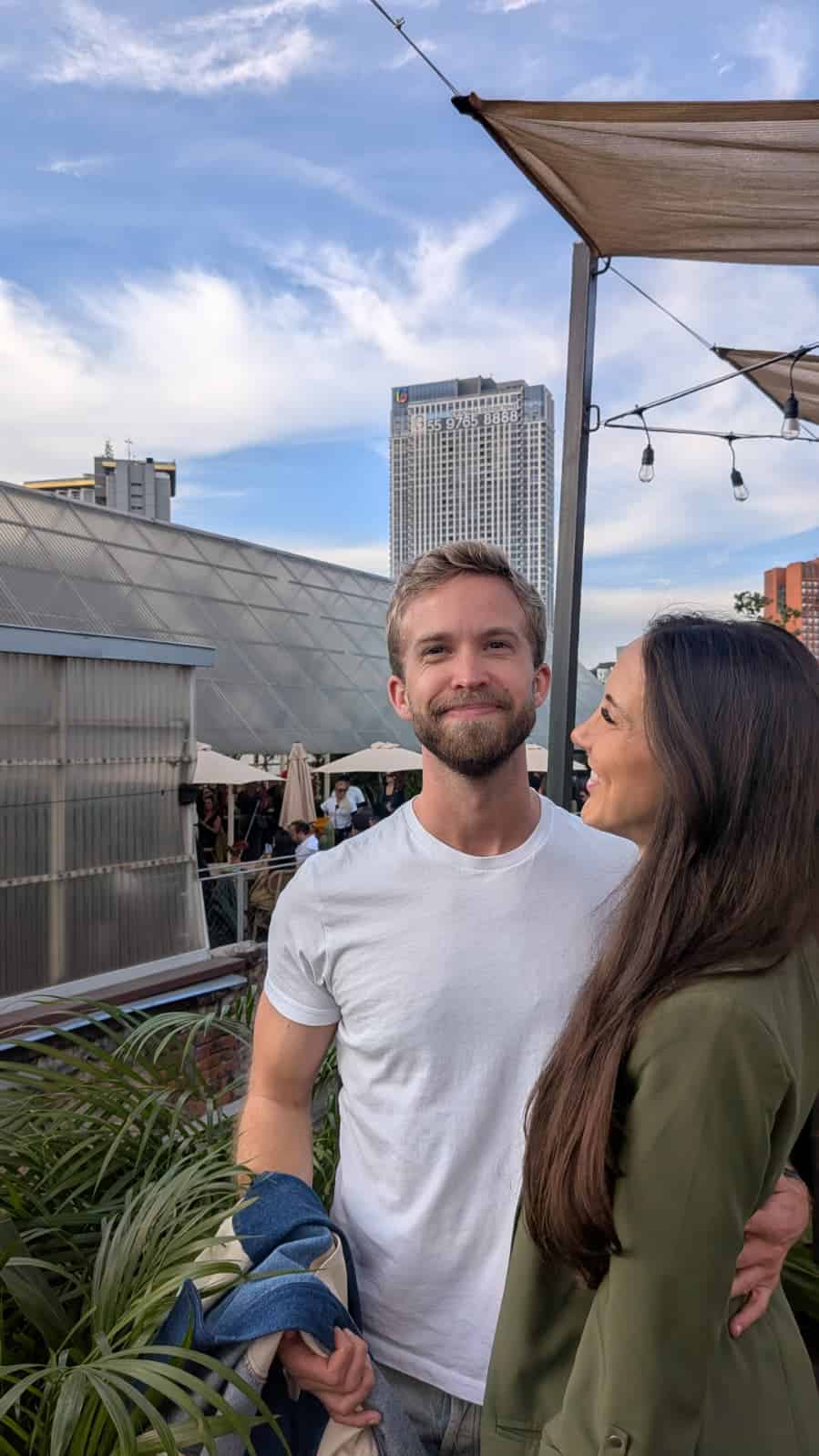 Couple on the terrace of salon acme