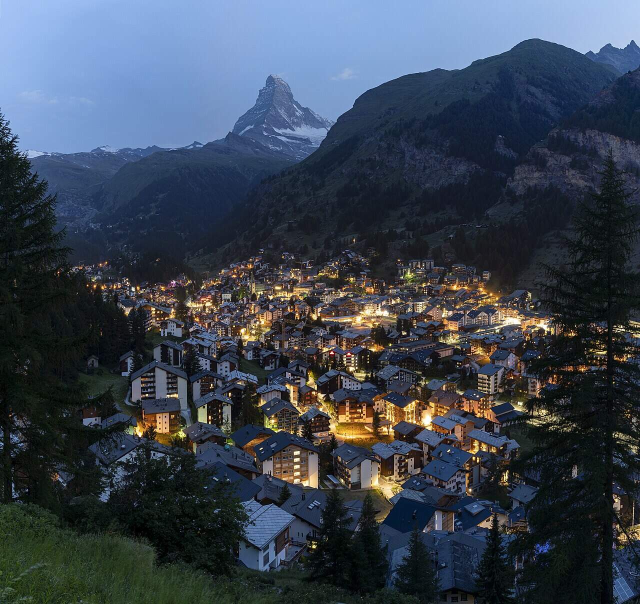 european summer vacation zermatt at night with lit up town