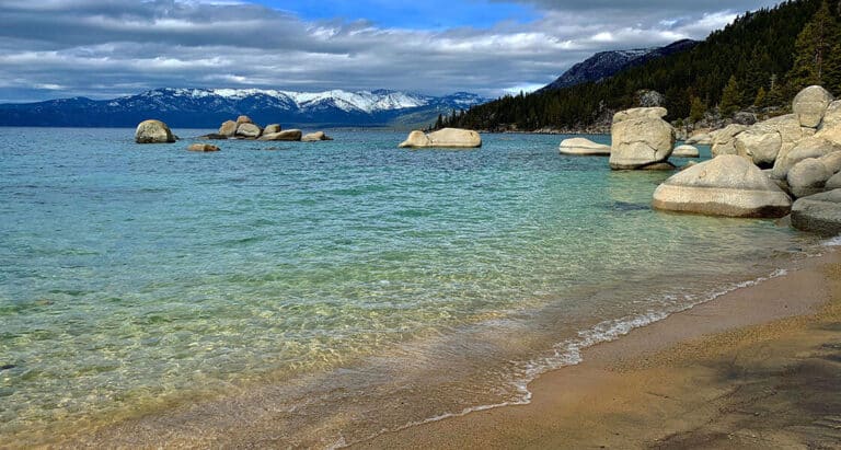 blue water and big stones at whale beach in lake tahoe