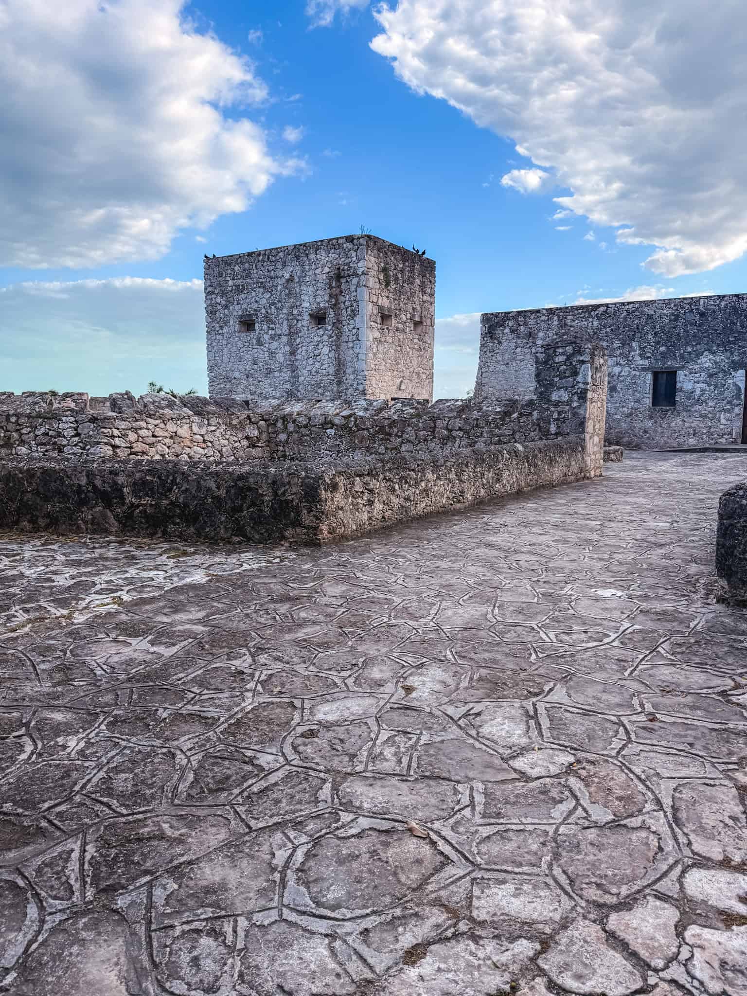 Stone walls and watchtower at Fort San Felipe in Bacalar, a 17th-century Spanish fort and one of the top historical things to do in Bacalar