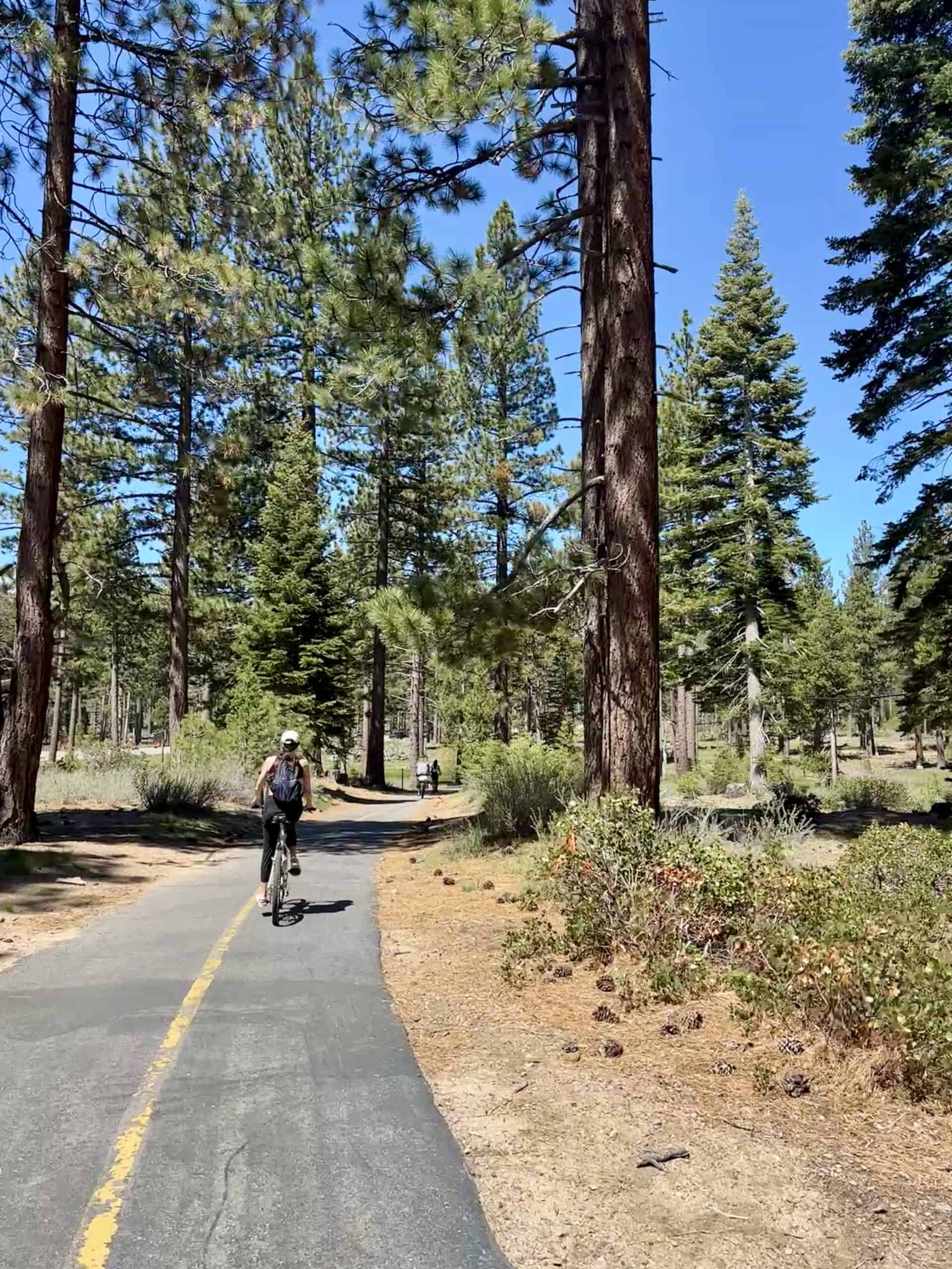woman biking in lake tahoe