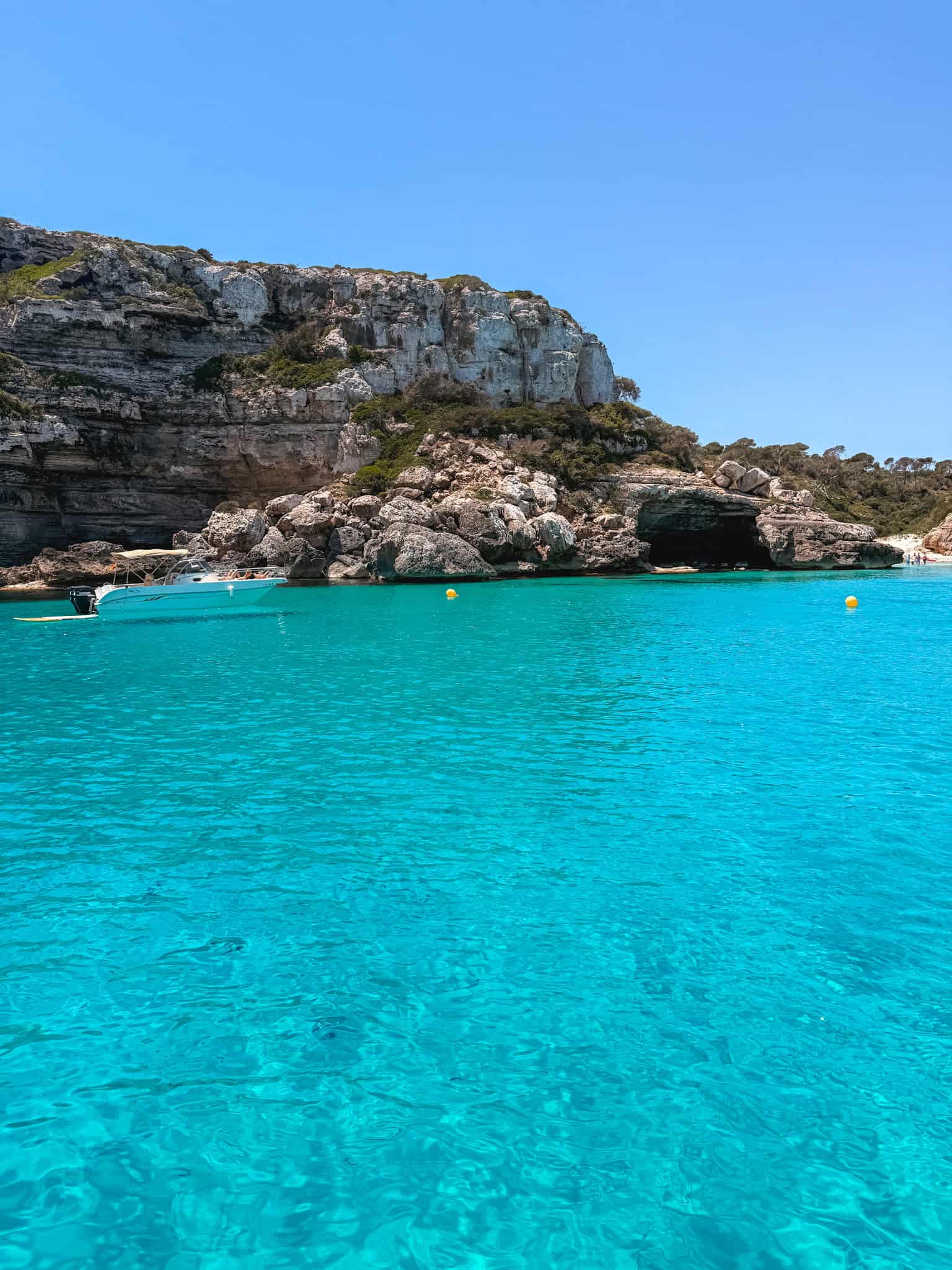 Crystal-clear turquoise water and sea caves on a Mallorca boat tour near Cala d'Or