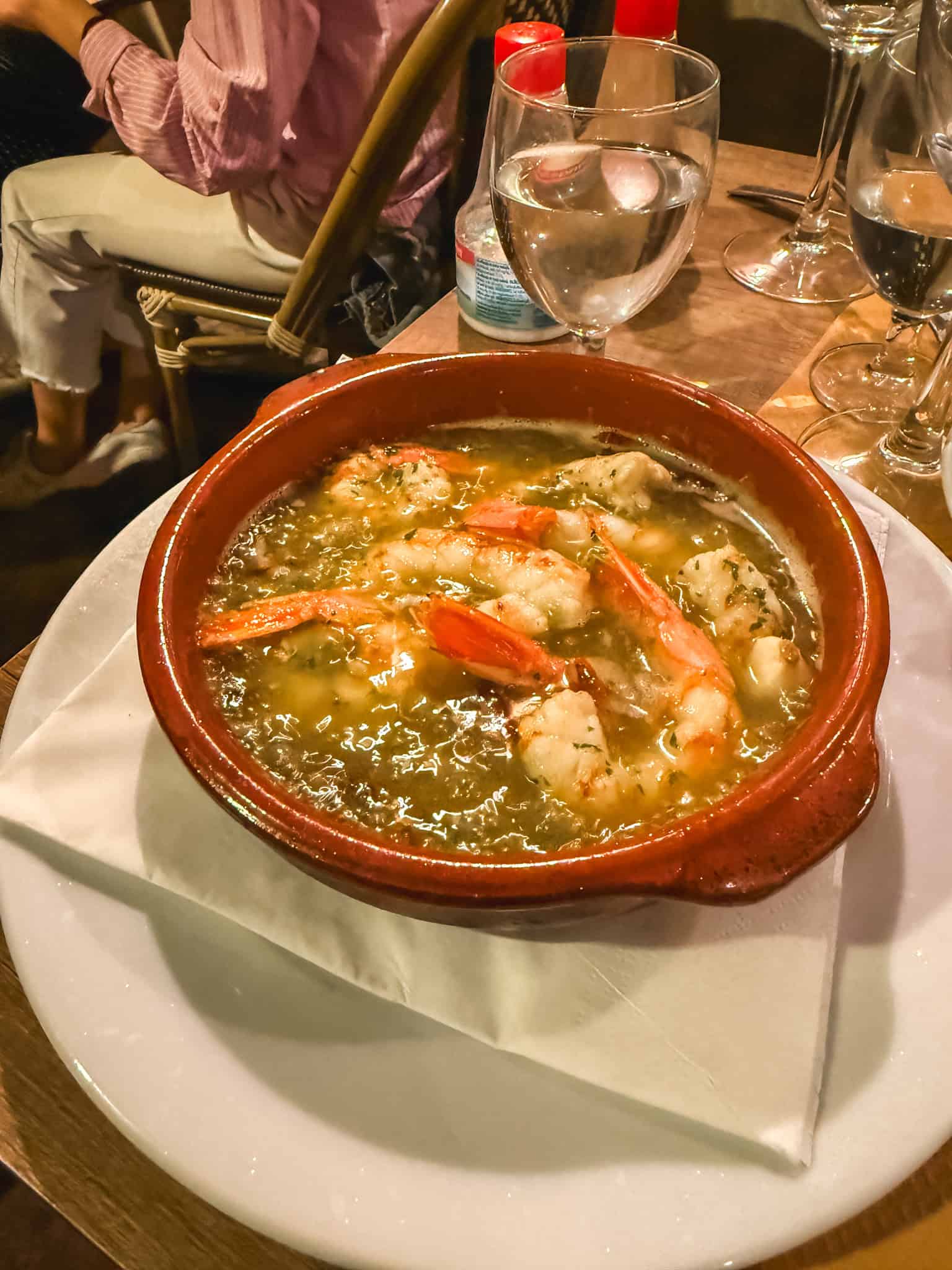 Garlic shrimp served in traditional clay dish in Palma de Mallorca