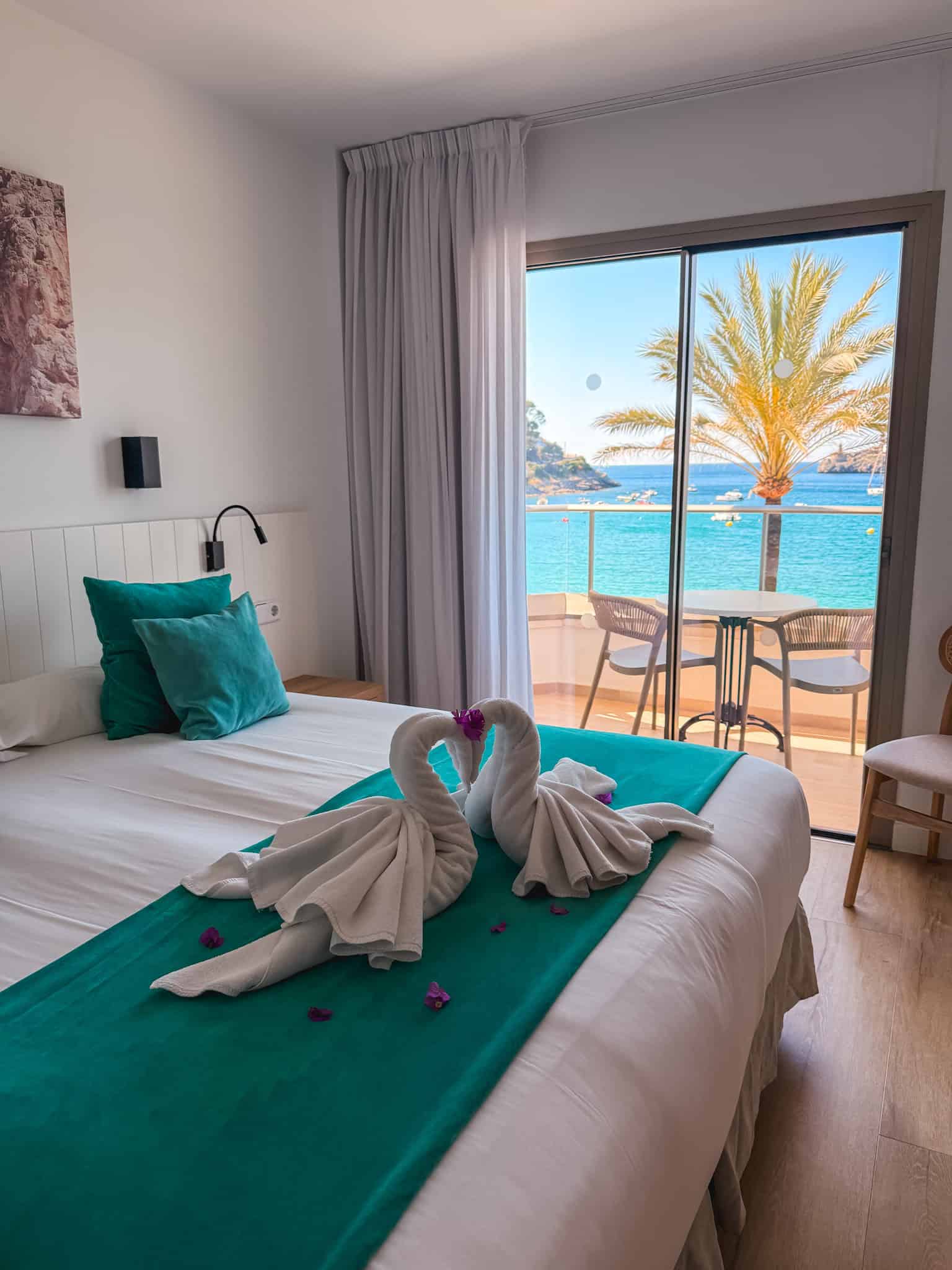 Oceanfront hotel room with balcony overlooking Cala d'Or, Mallorca
