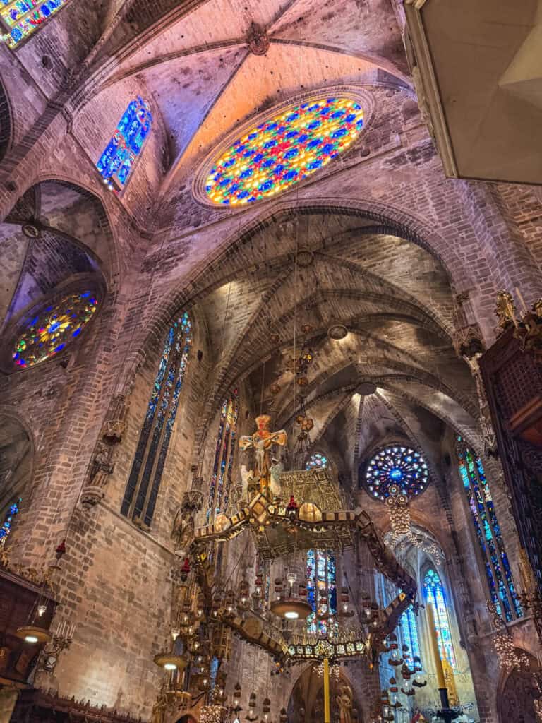 Colorful stained glass windows inside Palma Cathedral