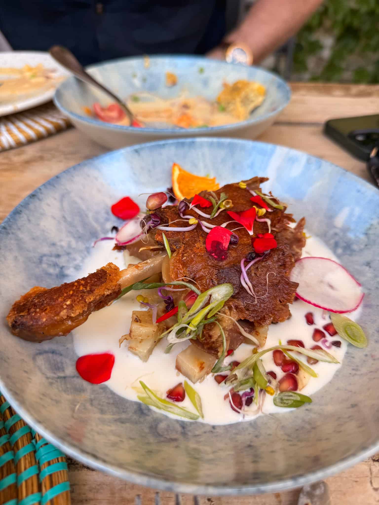 Slow-roasted duck with vegetables at Es Taller restaurant in Mallorca