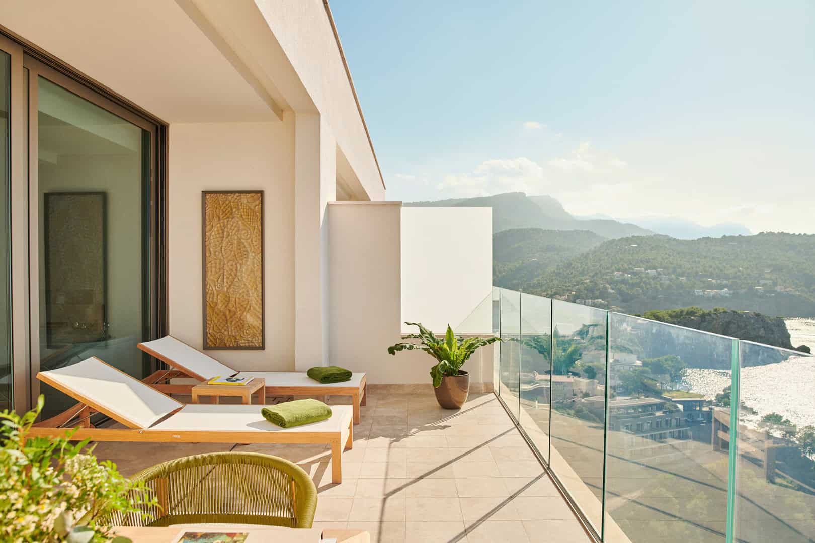 Ocean view sun loungers on a private balcony at Jumeirah Port Soller, one of the best hotels in Mallorca